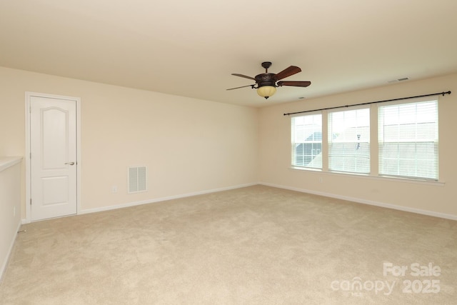 309 Kentmere Ln, Clover, SC 29710 - empty room featuring light colored carpet, ceiling fan, visible vents, and baseboards
