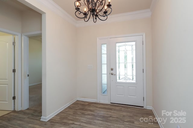 309 Kentmere Ln, Clover, SC 29710 - entryway with an inviting chandelier, baseboards, ornamental molding, and wood finished floors