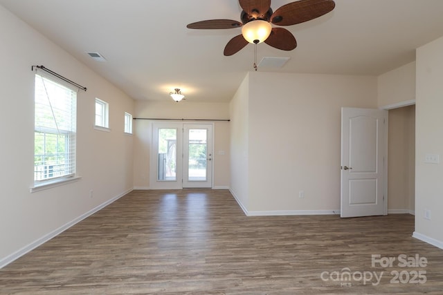 309 Kentmere Ln, Clover, SC 29710 - unfurnished room featuring baseboards, ceiling fan, wood finished floors, and visible vents