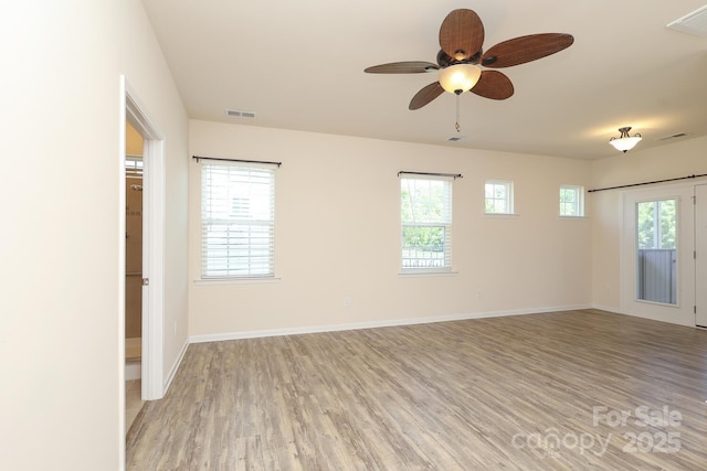 309 Kentmere Ln, Clover, SC 29710 - spare room featuring visible vents, a ceiling fan, light wood finished floors, and baseboards