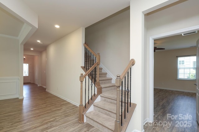 309 Kentmere Ln, Clover, SC 29710 - staircase featuring recessed lighting, visible vents, plenty of natural light, and wood finished floors
