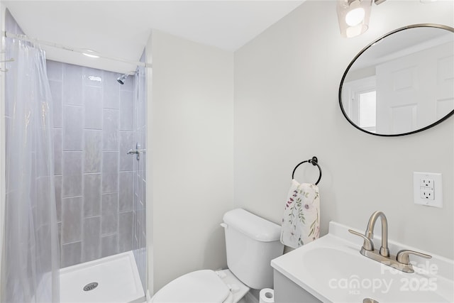 1104 Venus St, Kannapolis, NC 28083 - bathroom featuring toilet, tiled shower, and vanity