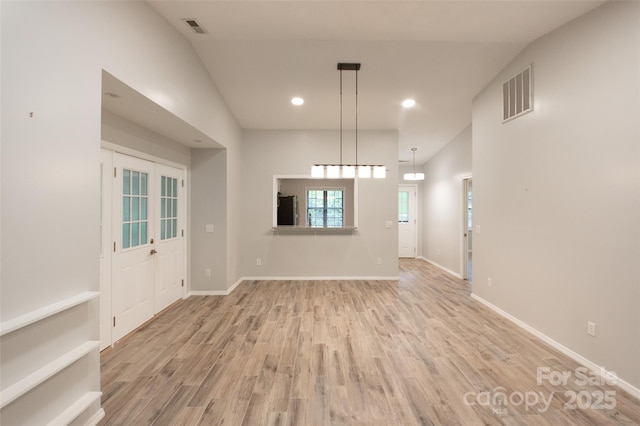 interior space with visible vents, recessed lighting, baseboards, and wood finished floors