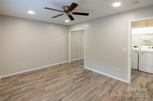 spare room featuring separate washer and dryer, recessed lighting, light wood-style flooring, and ceiling fan