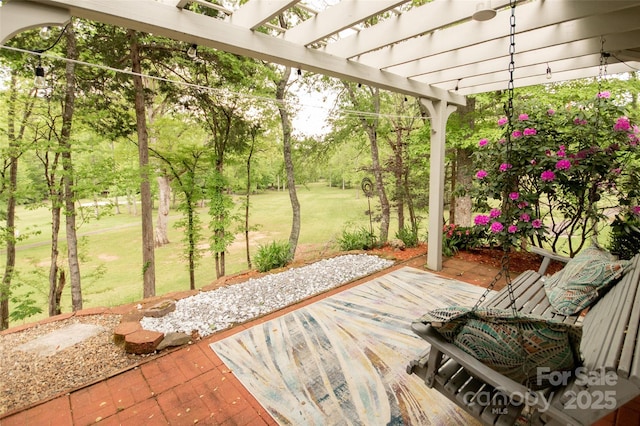 view of patio / terrace featuring a pergola