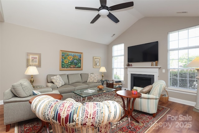 2114 N Castle Ct, Matthews, NC 28105 - living room featuring a ceiling fan, baseboards, visible vents, wood finished floors, and a fireplace