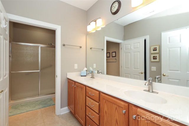 2114 N Castle Ct, Matthews, NC 28105 - full bath featuring double vanity, tile patterned flooring, a shower stall, and a sink