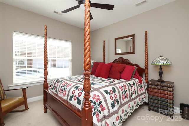 2114 N Castle Ct, Matthews, NC 28105 - bedroom with light colored carpet, visible vents, baseboards, and a ceiling fan