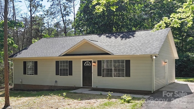 7525 Cedarbrook Dr, Charlotte, NC 28215 - view of front of property featuring roof with shingles