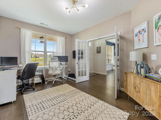 home office featuring french doors, visible vents, baseboards, a notable chandelier, and dark wood-type flooring