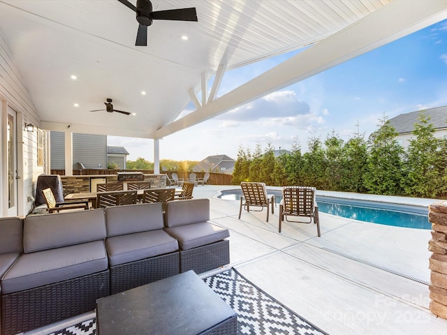 view of patio with a fenced in pool, a ceiling fan, outdoor dining area, and an outdoor living space