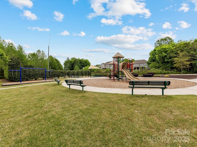 communal playground featuring a yard