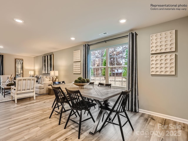 dining room with recessed lighting, light wood-style flooring, baseboards, and visible vents