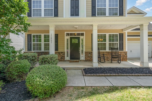 15807 Foreleigh Rd, Huntersville, NC 28078 - doorway to property with a porch and stone siding