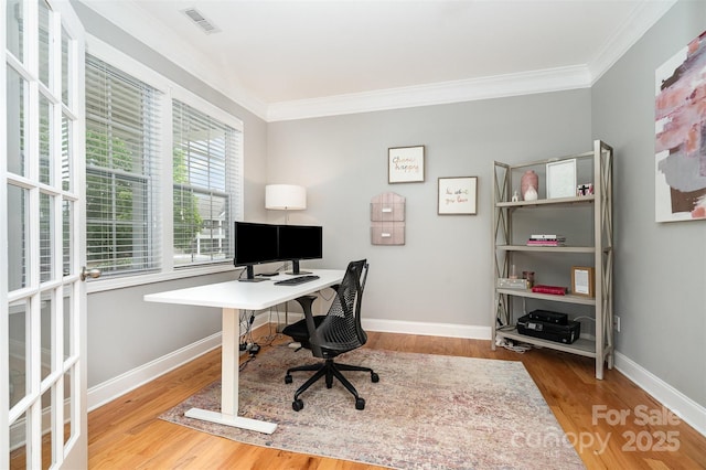 15807 Foreleigh Rd, Huntersville, NC 28078 - home office with crown molding, wood finished floors, and baseboards