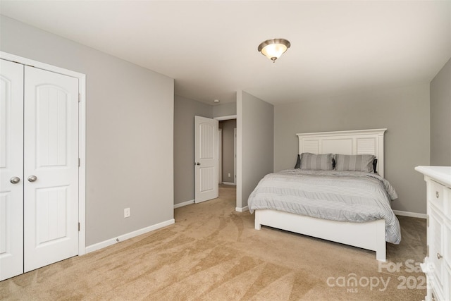 15807 Foreleigh Rd, Huntersville, NC 28078 - bedroom with light colored carpet, baseboards, and a closet