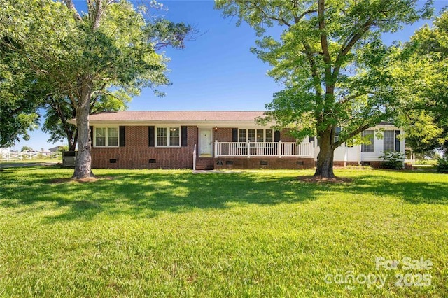 1723 Baskins Hill Rd, Heath Springs, SC 29058 - ranch-style house with a front yard, a porch, brick siding, and crawl space