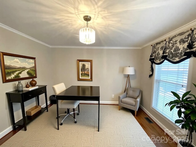 1723 Baskins Hill Rd, Heath Springs, SC 29058 - home office featuring crown molding, baseboards, a chandelier, and wood finished floors