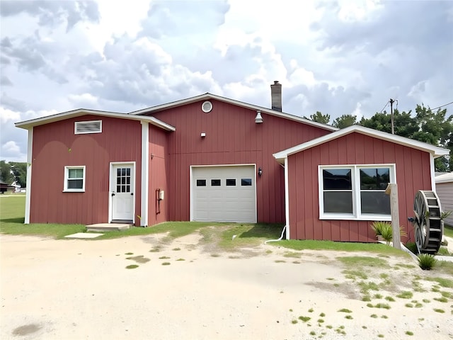 1723 Baskins Hill Rd, Heath Springs, SC 29058 - view of front of property with a garage, driveway, and a chimney