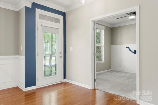 14625 Lyon Hill Ln, Huntersville, NC 28078 - entryway featuring crown molding, wainscoting, and wood finished floors