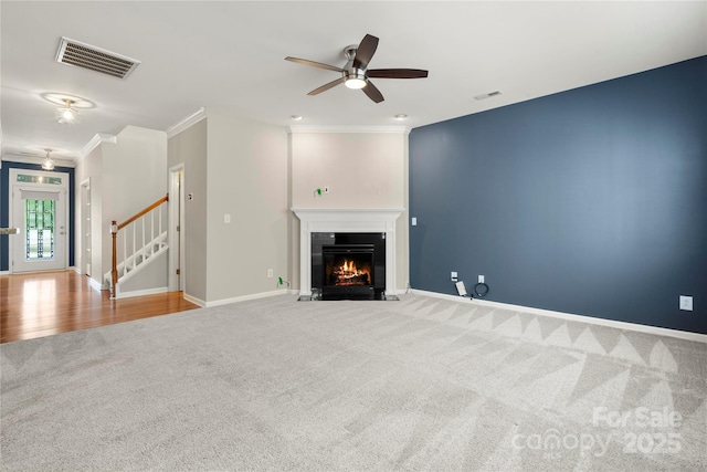 14625 Lyon Hill Ln, Huntersville, NC 28078 - unfurnished living room featuring carpet flooring, crown molding, visible vents, and ceiling fan