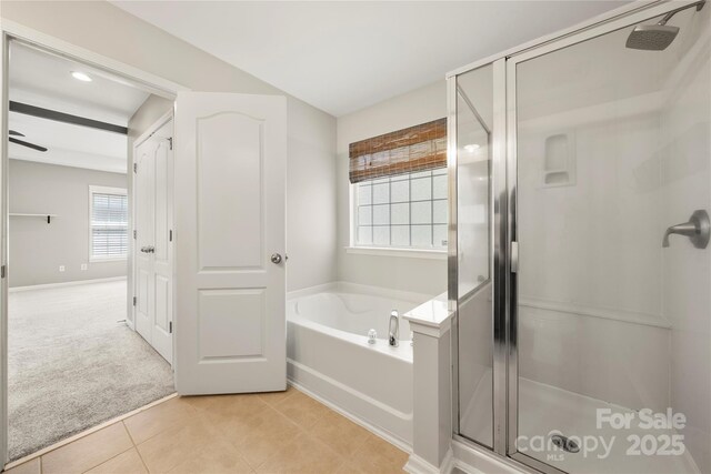 14625 Lyon Hill Ln, Huntersville, NC 28078 - full bath with tile patterned floors, baseboards, a garden tub, and a stall shower