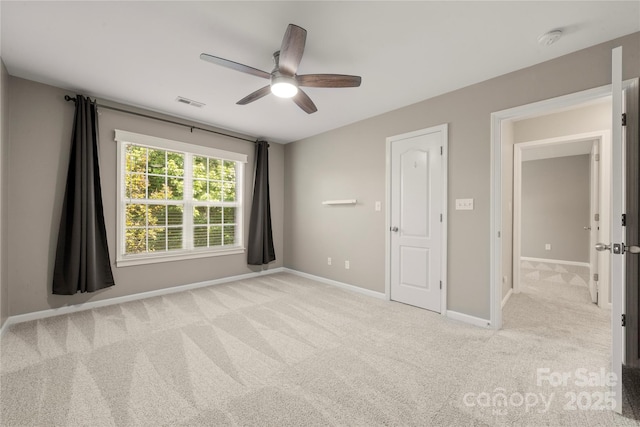 14625 Lyon Hill Ln, Huntersville, NC 28078 - unfurnished bedroom with visible vents, carpet flooring, baseboards, and a ceiling fan