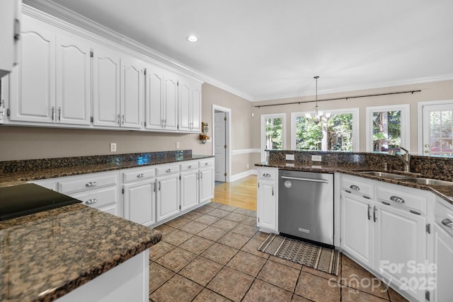 2608 Carmarthen Ct, Matthews, NC 28104 - kitchen featuring dishwasher, white cabinets, ornamental molding, light tile patterned flooring, and dark stone counters