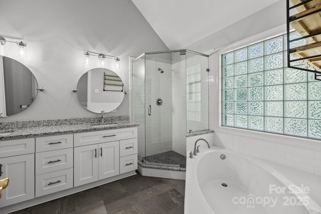 2608 Carmarthen Ct, Matthews, NC 28104 - full bathroom featuring a bath, a stall shower, double vanity, vaulted ceiling, and marble finish flooring