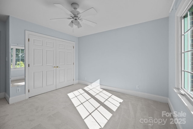 2608 Carmarthen Ct, Matthews, NC 28104 - unfurnished bedroom with carpet and multiple windows