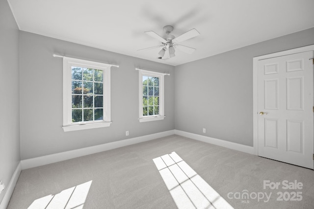 2608 Carmarthen Ct, Matthews, NC 28104 - unfurnished bedroom featuring light colored carpet and a ceiling fan