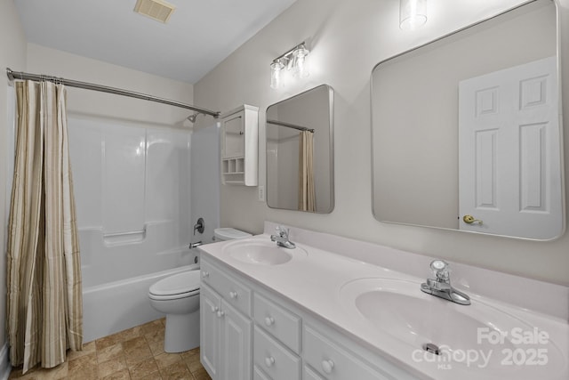 2608 Carmarthen Ct, Matthews, NC 28104 - bathroom with double vanity and shower / bath combination with curtain