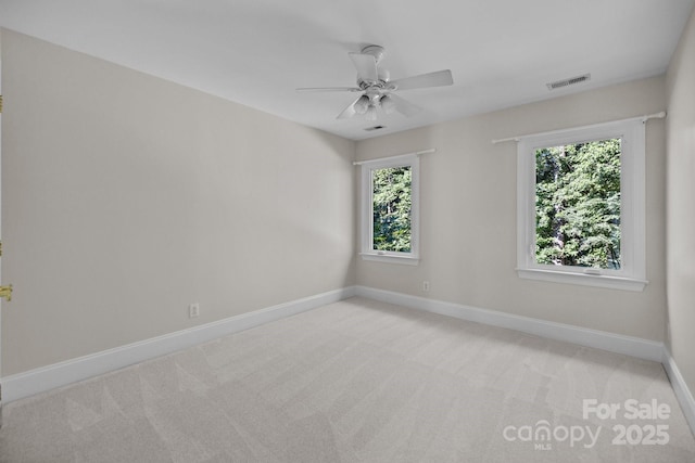 2608 Carmarthen Ct, Matthews, NC 28104 - unfurnished room featuring light carpet and a ceiling fan