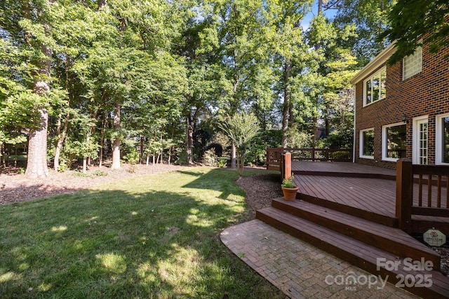 2608 Carmarthen Ct, Matthews, NC 28104 - view of grassy yard featuring a wooden deck