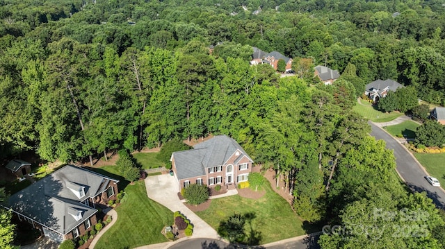 2608 Carmarthen Ct, Matthews, NC 28104 - aerial view of property's location with a heavily wooded area