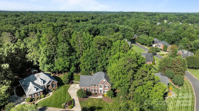 2608 Carmarthen Ct, Matthews, NC 28104 - aerial overview of property's location featuring a heavily wooded area