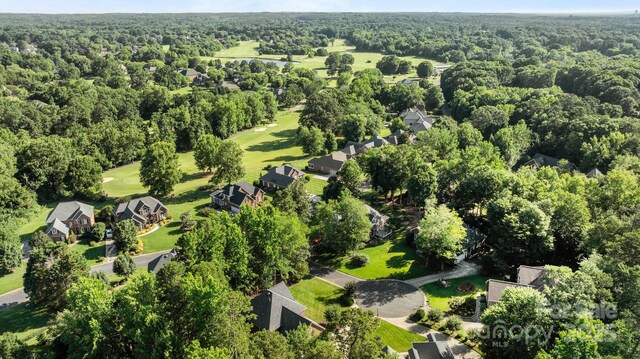 2608 Carmarthen Ct, Matthews, NC 28104 - aerial view of residential area featuring a forest