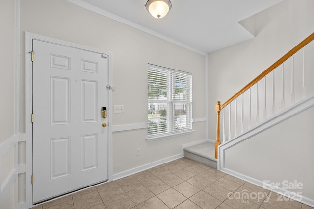 104 Clydesdale Ct, Matthews, NC 28104 - entrance foyer with stairs, light tile patterned floors, and crown molding