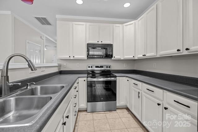 104 Clydesdale Ct, Matthews, NC 28104 - kitchen featuring stainless steel range with electric stovetop, black microwave, white cabinets, and recessed lighting