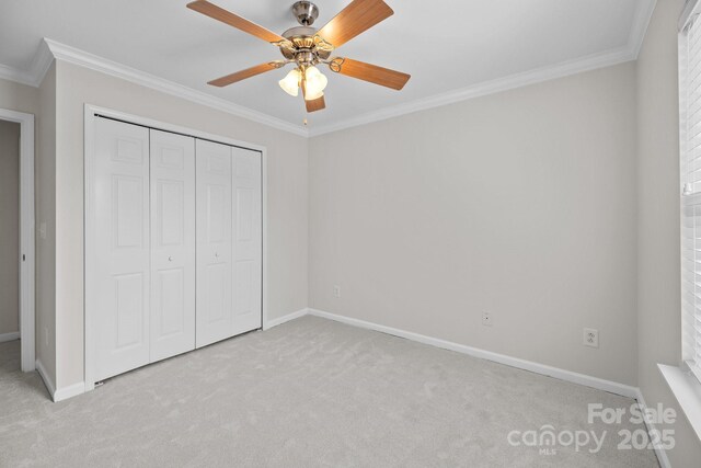 104 Clydesdale Ct, Matthews, NC 28104 - unfurnished bedroom with carpet floors, crown molding, a closet, and a ceiling fan