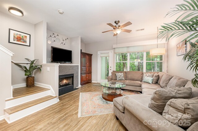 15318 Coventry Court Ln, Charlotte, NC 28277 - living area featuring baseboards, a ceiling fan, light wood-style flooring, and visible vents
