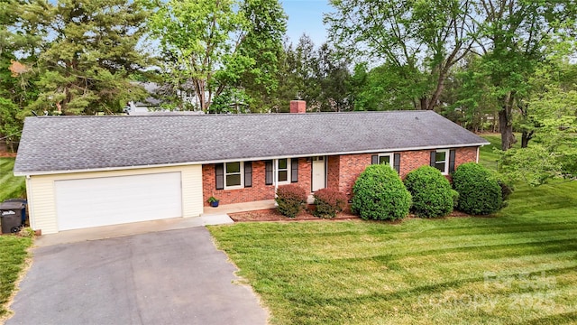 326 N Greenbriar Rd, Statesville, NC 28625 - single story home with a front yard, a chimney, brick siding, a shingled roof, and driveway