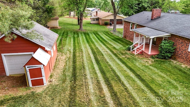 326 N Greenbriar Rd, Statesville, NC 28625 - view of yard featuring fence and an outbuilding