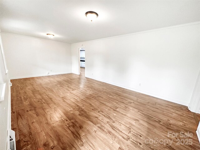 326 N Greenbriar Rd, Statesville, NC 28625 - unfurnished room featuring crown molding and light wood finished floors