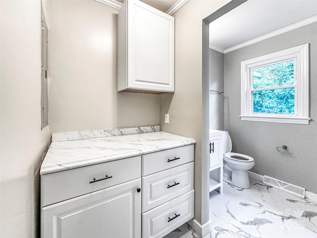 326 N Greenbriar Rd, Statesville, NC 28625 - bathroom featuring visible vents, baseboards, toilet, marble finish floor, and ornamental molding