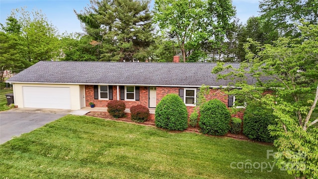 326 N Greenbriar Rd, Statesville, NC 28625 - ranch-style home featuring brick siding, a shingled roof, a front yard, and concrete driveway
