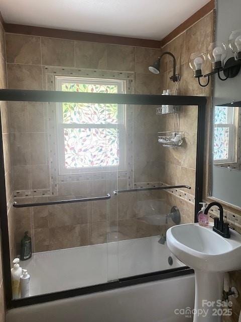 full bathroom with enclosed tub / shower combo
