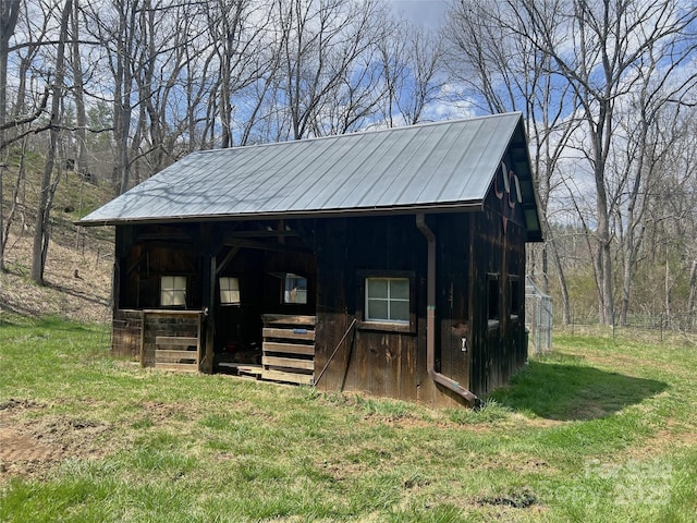 view of outbuilding featuring an exterior structure and an outbuilding