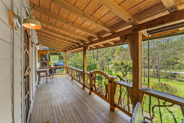 wooden terrace featuring a porch