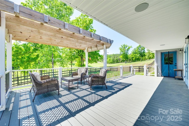 wooden terrace with an outdoor living space and a pergola